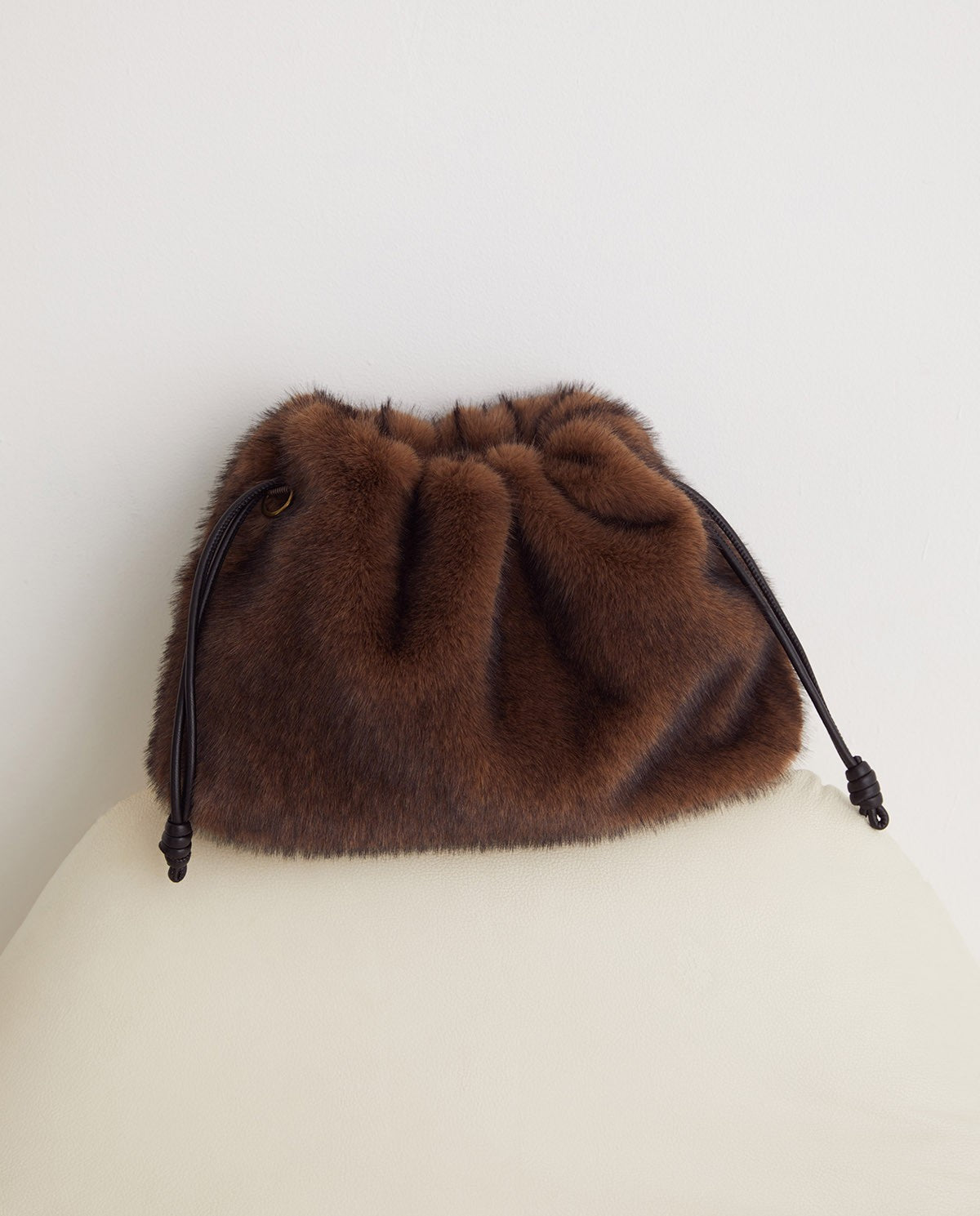 Chocolate fur bag with adjustable leather handle