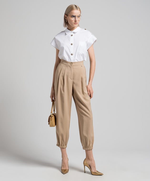 Shirt with branded buttons