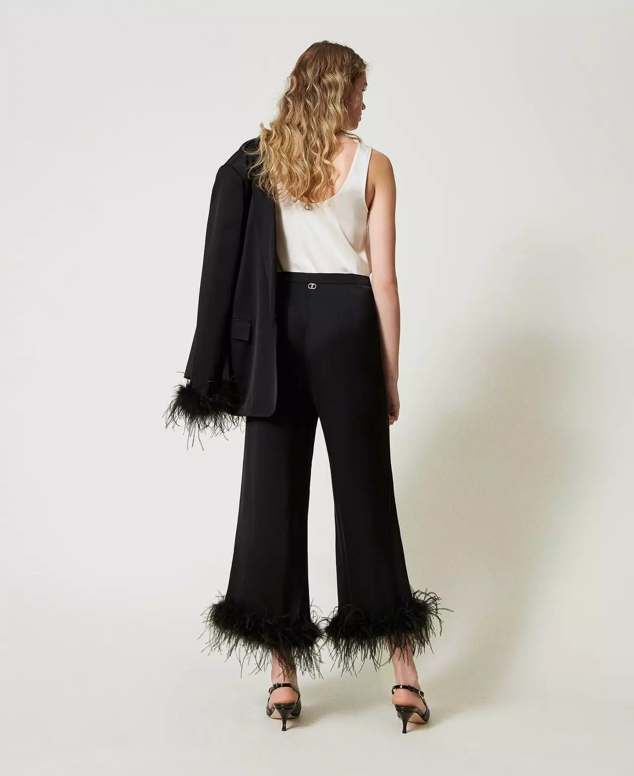 Satin trousers with feathers