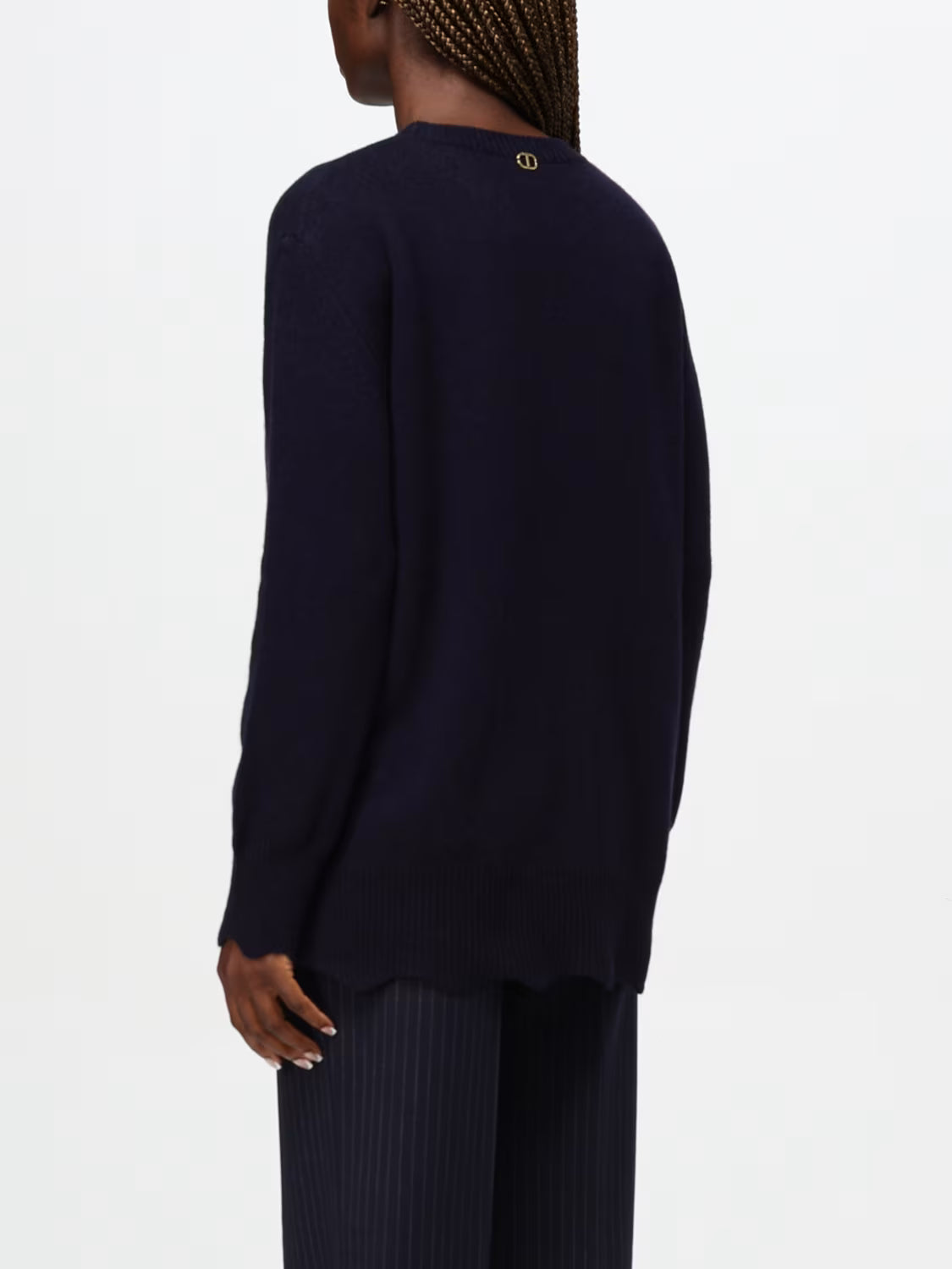 Maxi sweater with wavy cut