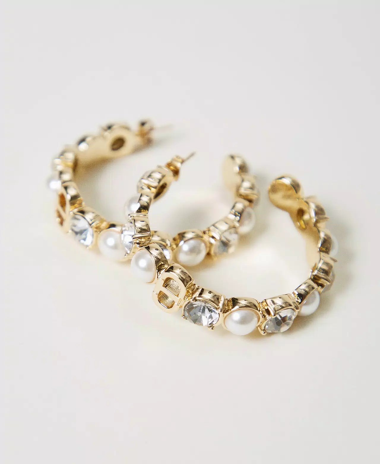 Loop earrings with pearls and rhinestones