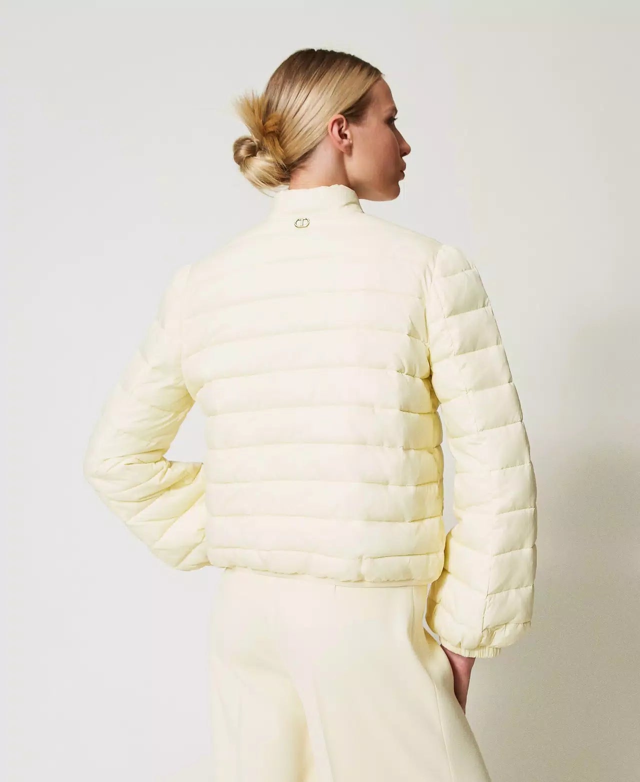 Lightweight puffer jacket with logo buttons