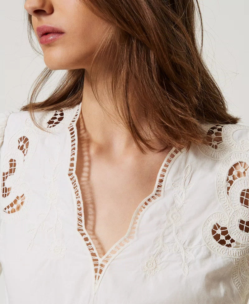 Blouse with openwork embroidery