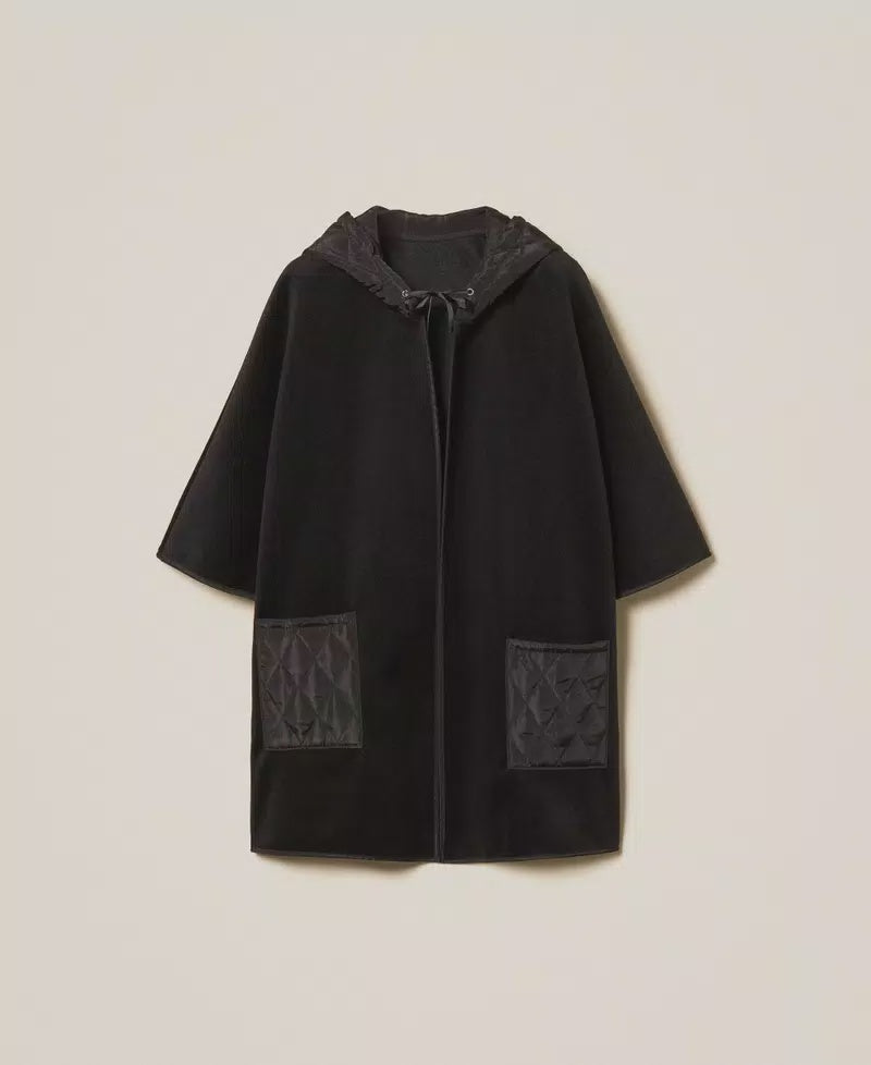 Knit poncho with pockets