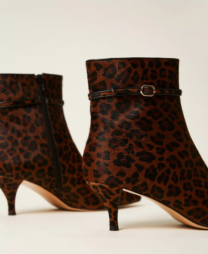 Leather ankle boots with animal print