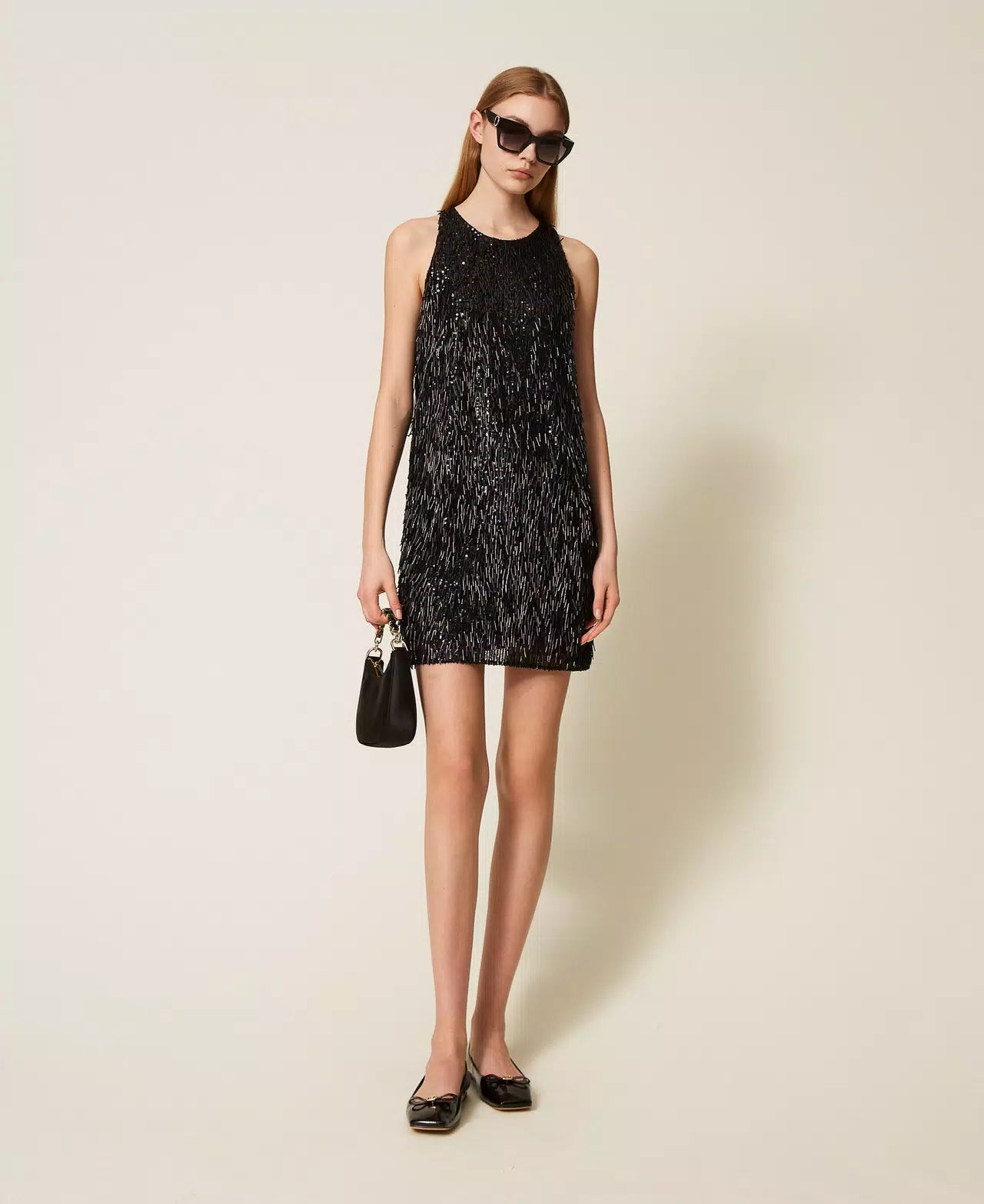 Short dress with sequin fringes