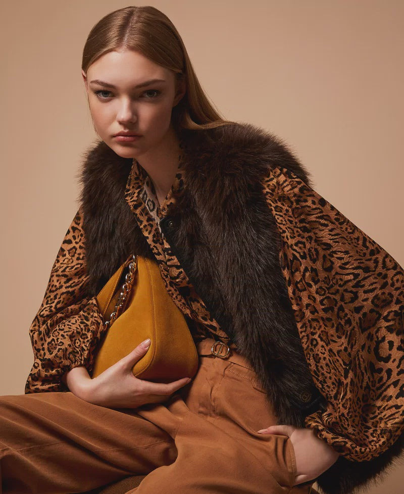 Sleeveless faux fur coat with buttons