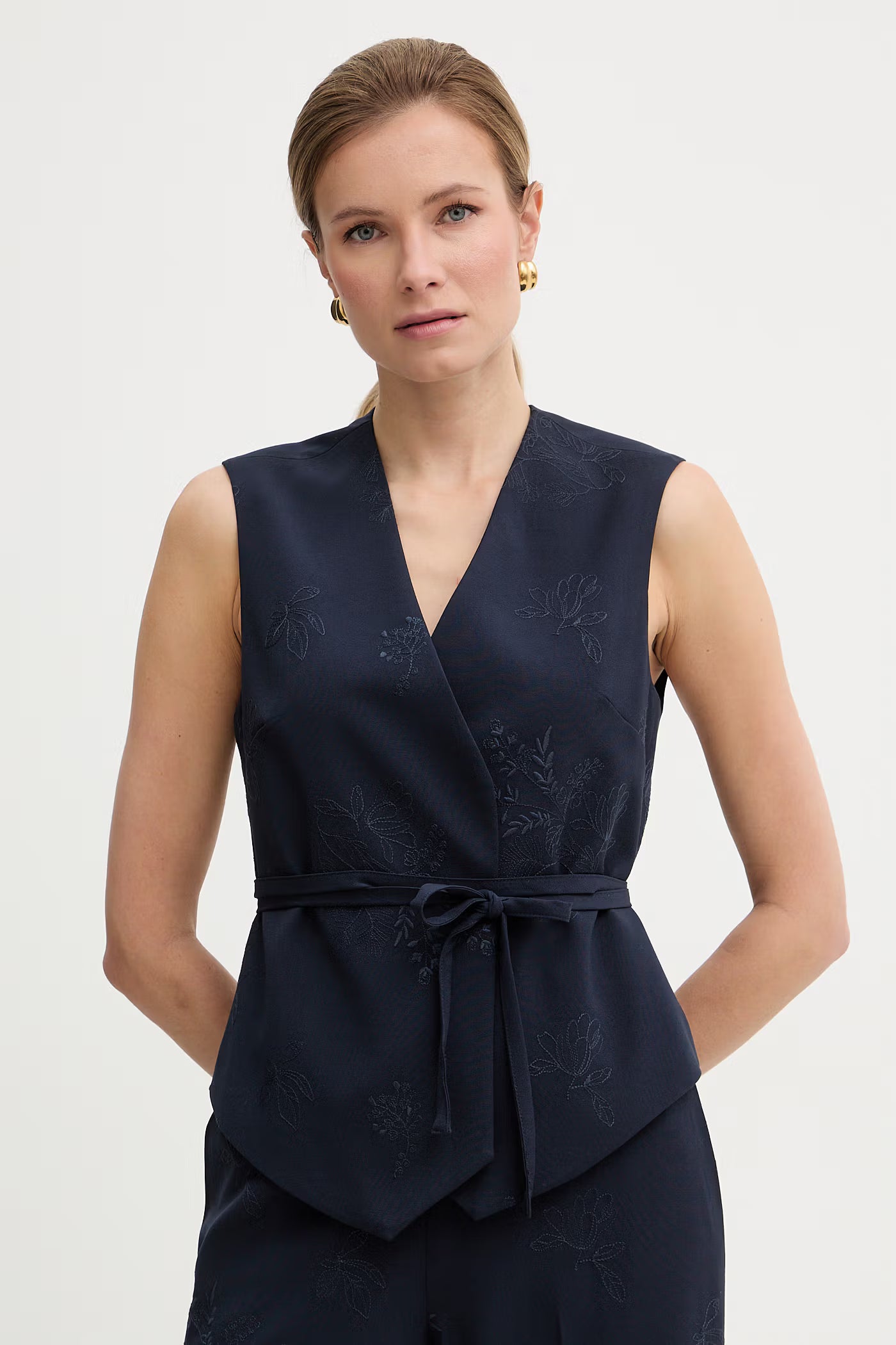 Embroidered waistcoat with belt