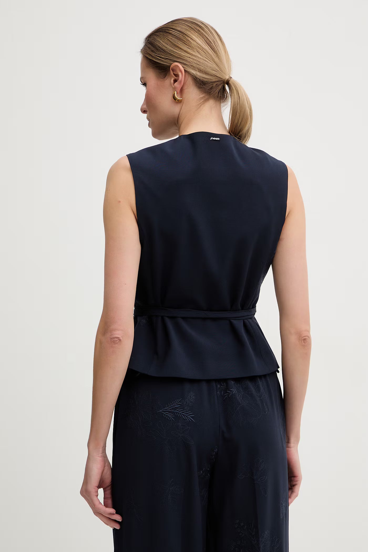 Embroidered waistcoat with belt