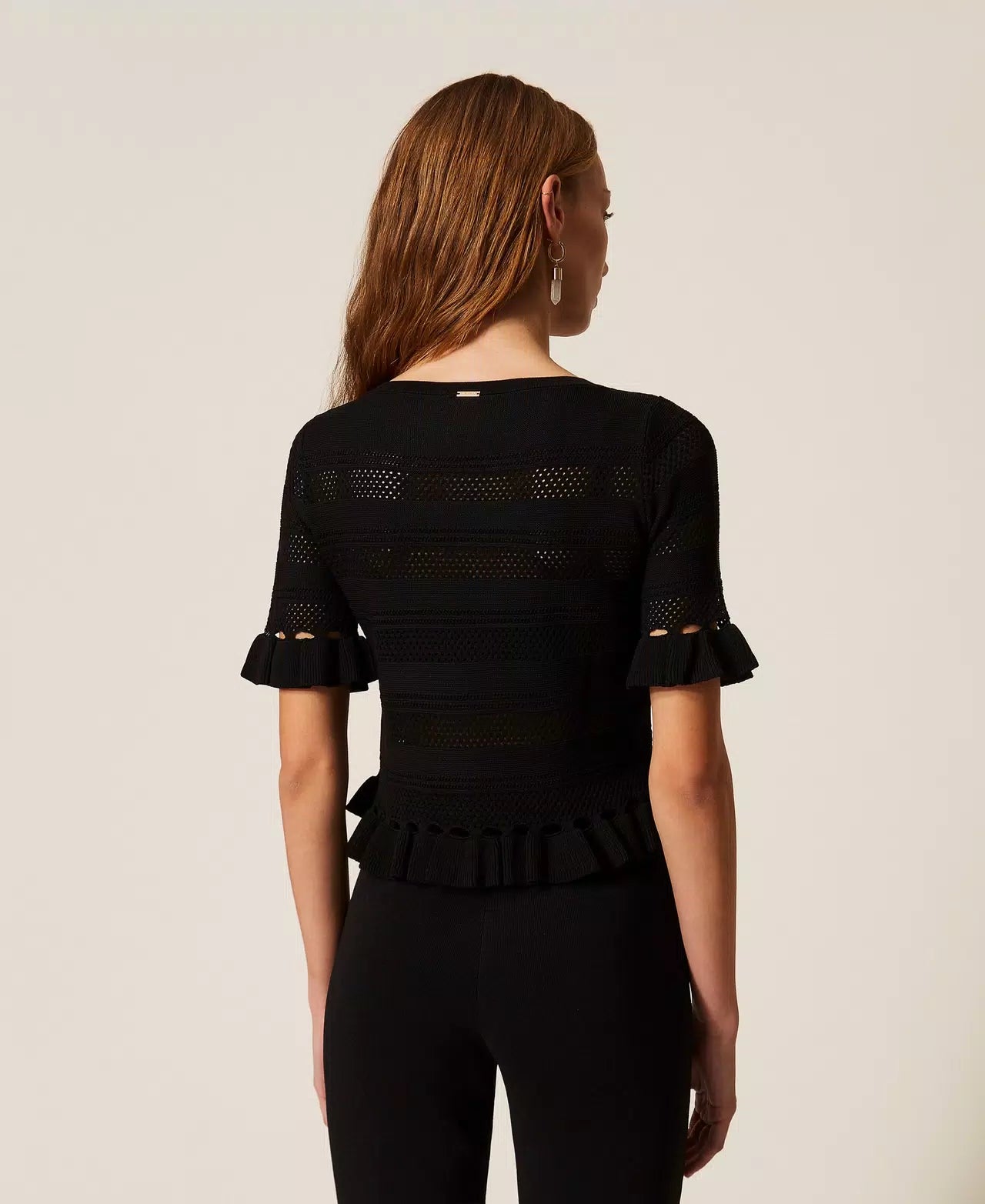 Black jumper with ruffles