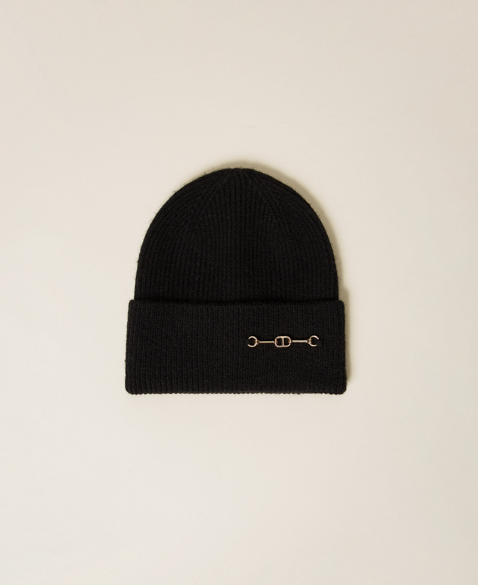 Black knit hat with charm