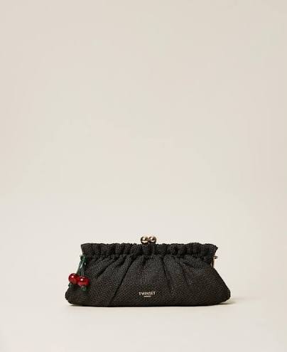 Raffia clutch with charm