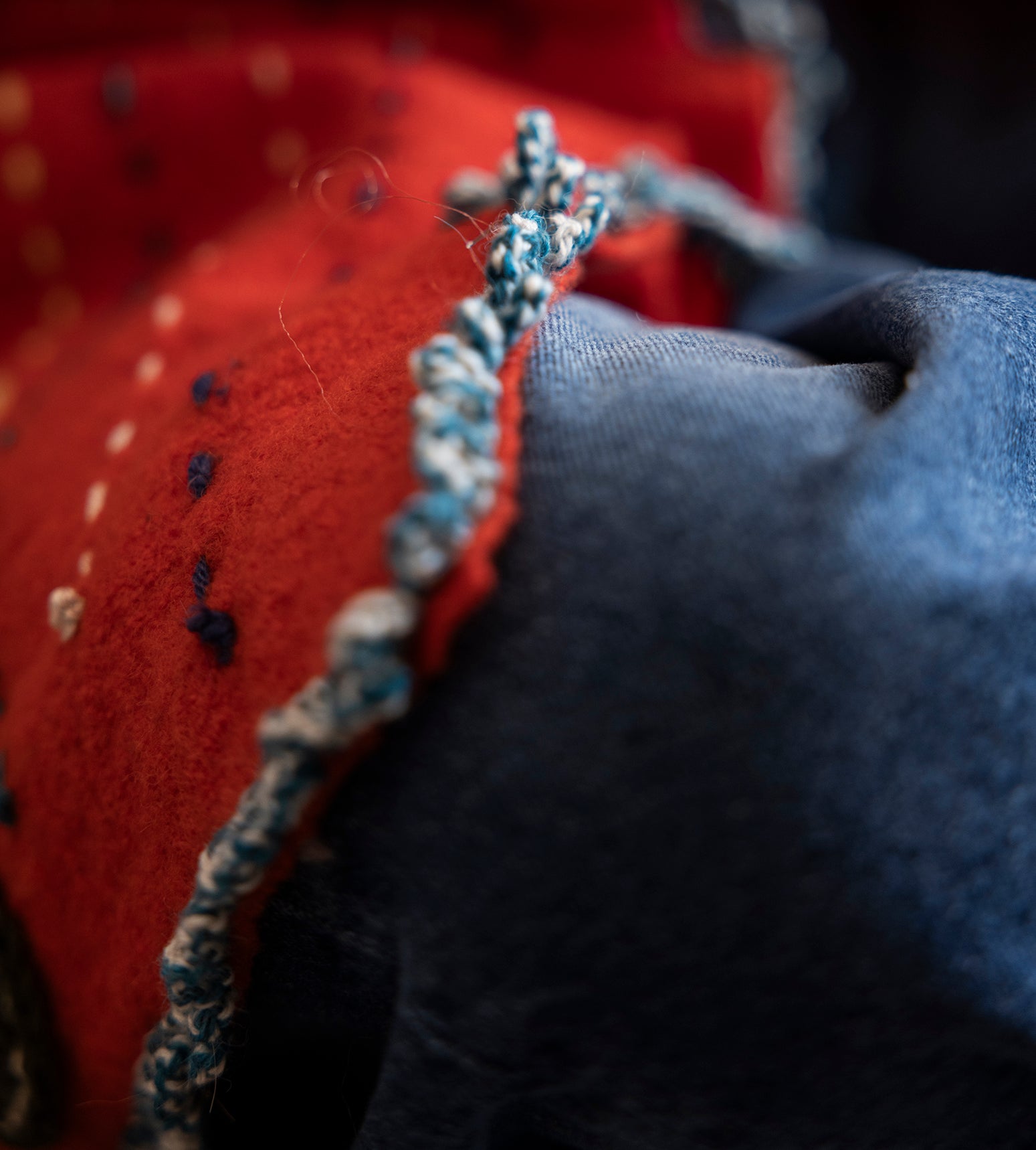 Ebru is sewing the fringes