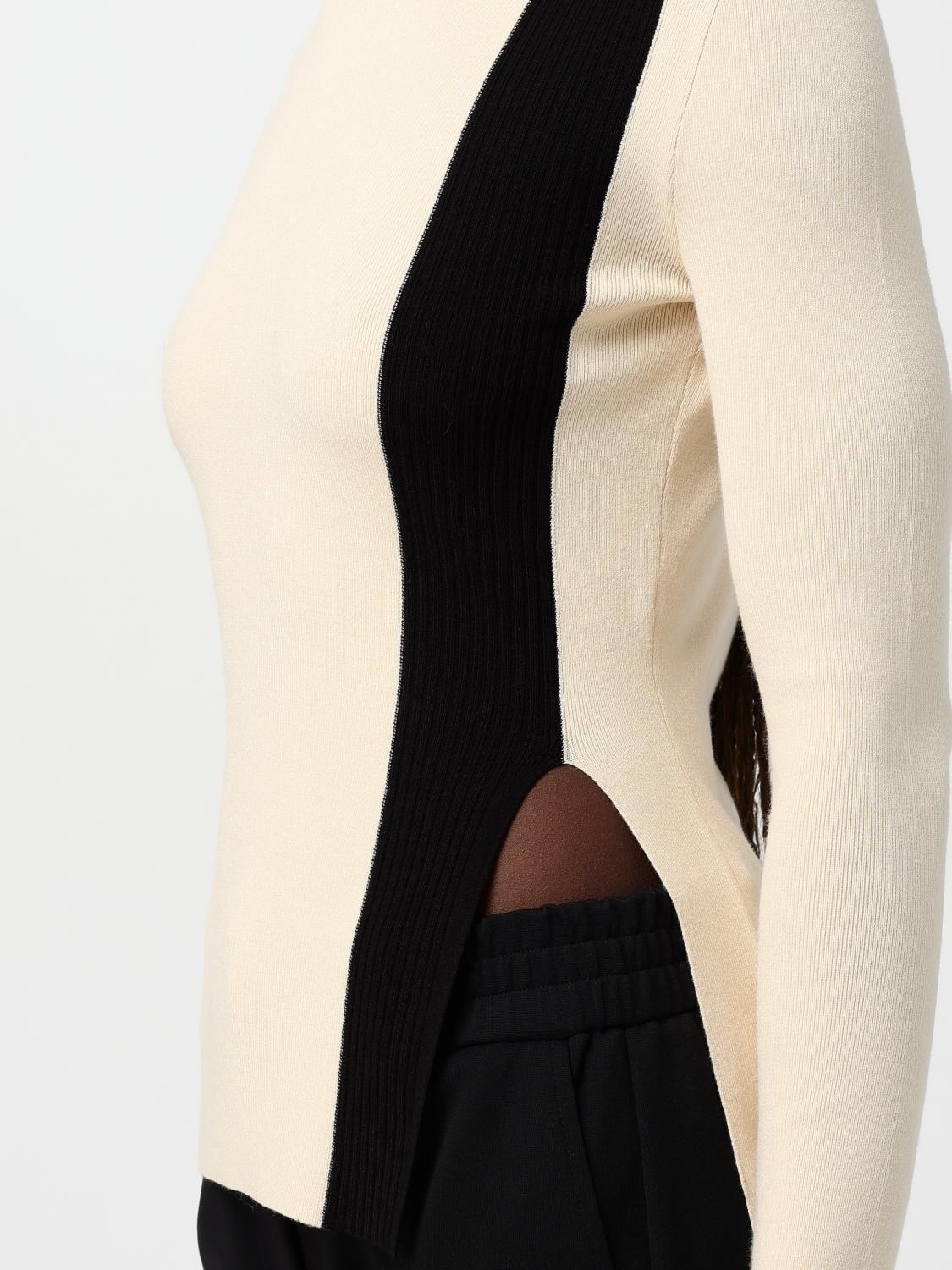 Knit top with side slit